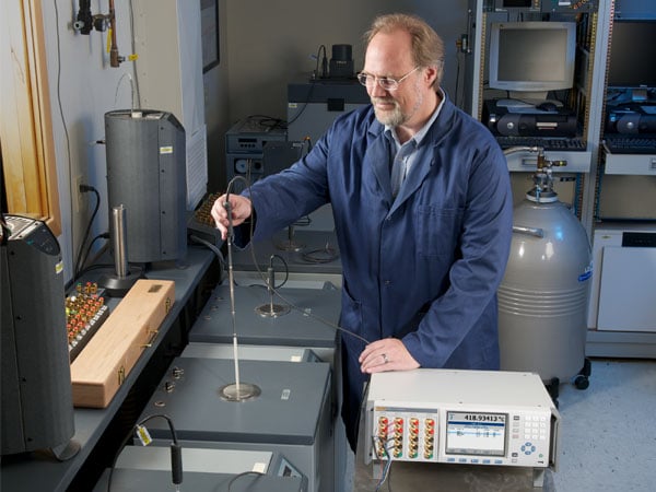 Technician Calibrating a Temperature Probe in a Fluke Calibration Lab